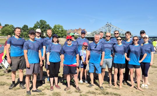 Group photo of the team at the Dragon Boat Festival 2025